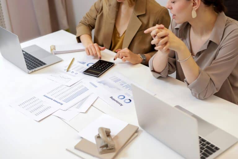 women collaborating for reports