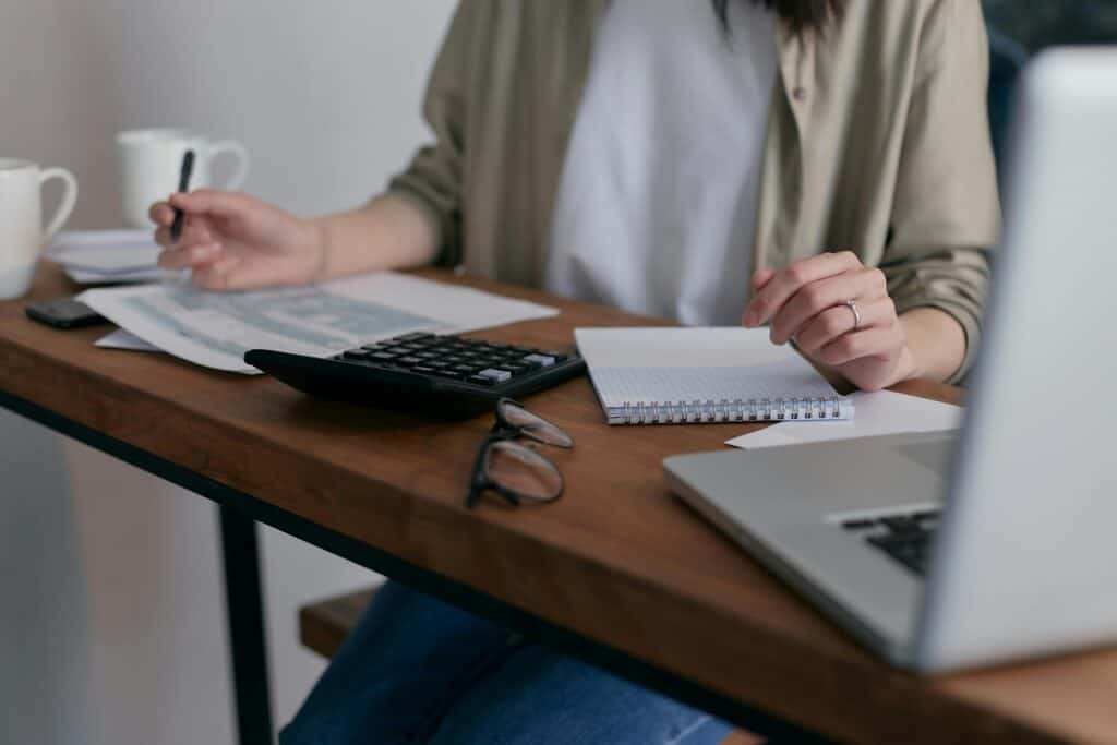 Woman computing taxes